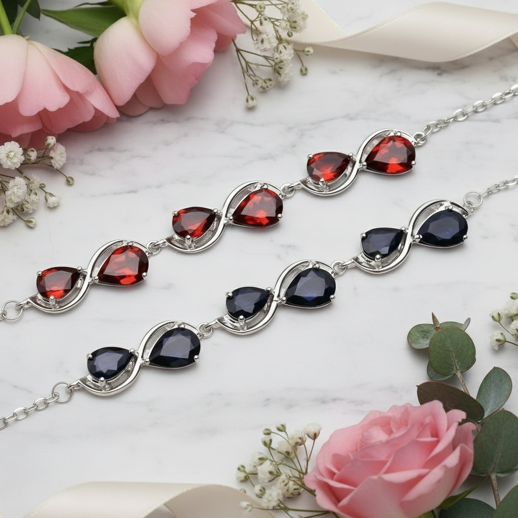 GRACE Pear Cut Gemstone Twist Style Bracelet in Sterling Silver