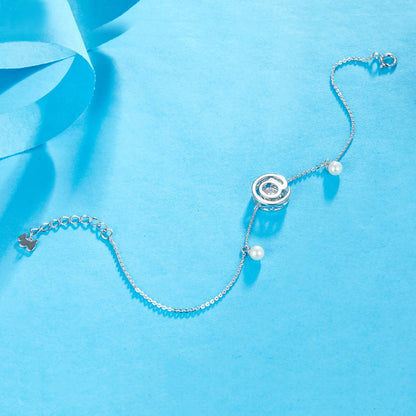 0.1 CT. Moissanite Diamond Dancing Stone with Freshwater Pearls @ Bracelet