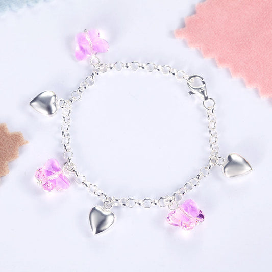 Pulsera de cadena con dije de corazón y mariposa rosa en plata de ley para niñas