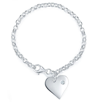 Pulsera de cadena con dije de corazón en plata de ley para niñas