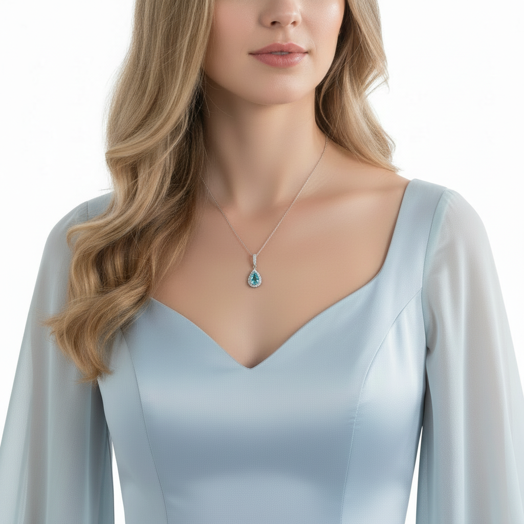 Collier avec pendentif halo en forme de larme et diamants simulés bleu aqua de 3 carats, en argent sterling