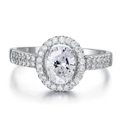 1.5 CT. Oval Cut Simulated Diamond Halo Ring in Sterling Silver