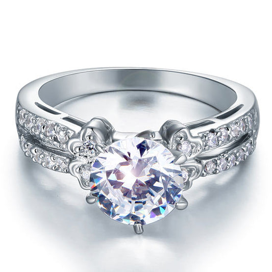 Bague pavée de diamants simulés à tige fendue de 2 carats en argent sterling