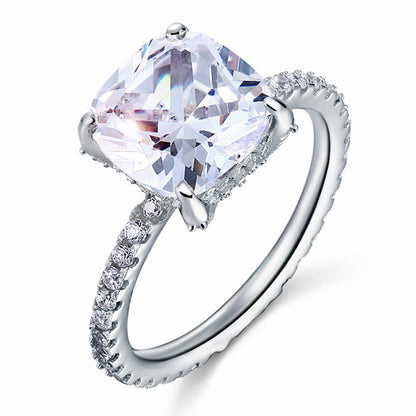 Anillo de eternidad de 5 quilates con diamantes simulados de talla cojín en plata de ley.