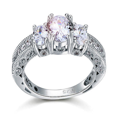Anillo vintage de tres piedras con diamantes simulados de talla ovalada en plata de ley