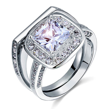 Conjunto nupcial de 2 quilates con halo de corte princesa en plata de ley