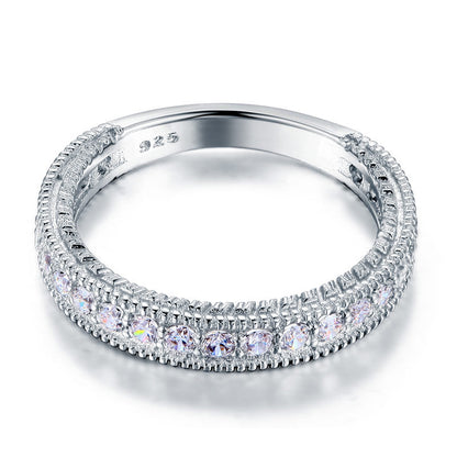 Anillo de eternidad con diamantes de imitación milgrain en plata de ley