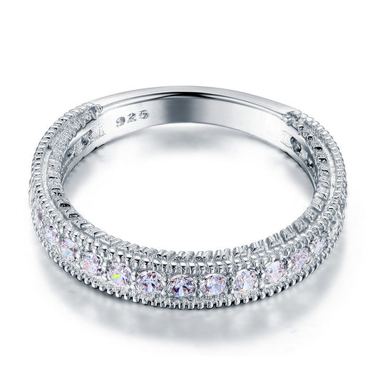 Anillo de eternidad con diamantes de imitación milgrain en plata de ley