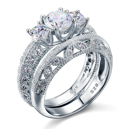 Conjunto nupcial de tres piedras de estilo vintage con diamantes simulados de 1,5 quilates en plata de ley.