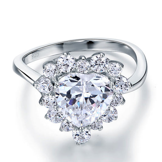 Anillo de halo de diamantes simulados de talla corazón de 2,5 quilates en plata de ley