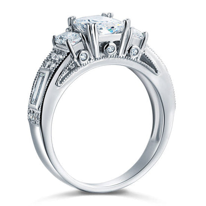 Anillo vintage de tres piedras con diamantes simulados de 1,5 quilates en plata de ley