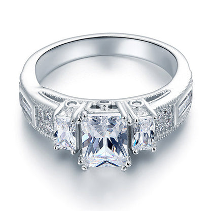 Anillo vintage de tres piedras con diamantes simulados de 1,5 quilates en plata de ley