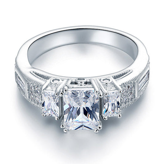 Anillo vintage de tres piedras con diamantes simulados de 1,5 quilates en plata de ley