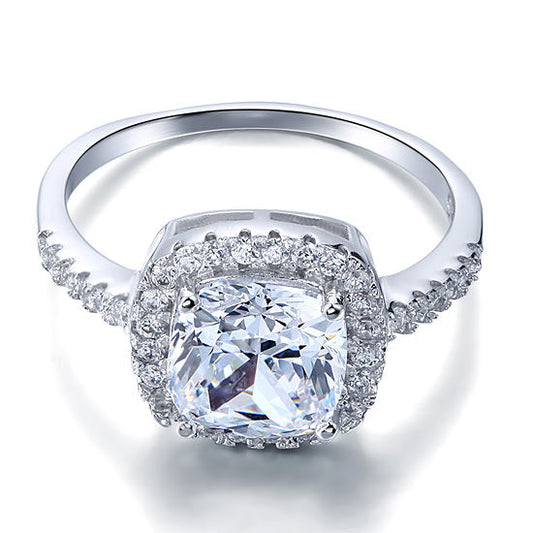 Anillo de halo de diamantes simulados de talla cojín de 3 quilates en plata de ley