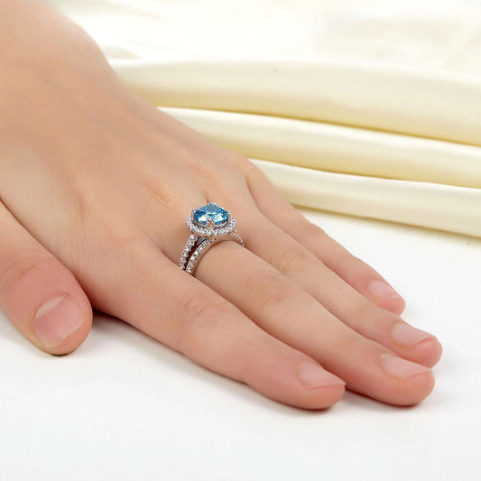 2 CT. Round Halo Aqua Blue Simulated Diamond Bridal Set in Sterling Silver