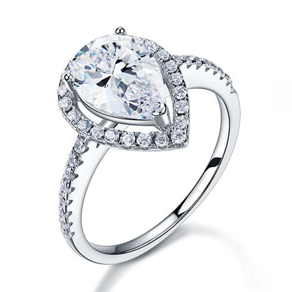 Anillo de plata de ley con halo de diamantes simulados de talla pera de 2 quilates