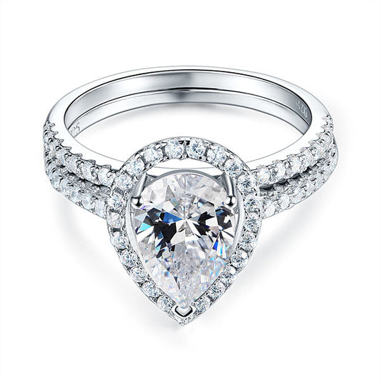2 CT. Pear Cut Simulated Diamond Halo Bridal Set in Sterling Silver
