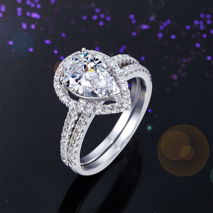2 CT. Pear Cut Simulated Diamond Halo Bridal Set in Sterling Silver