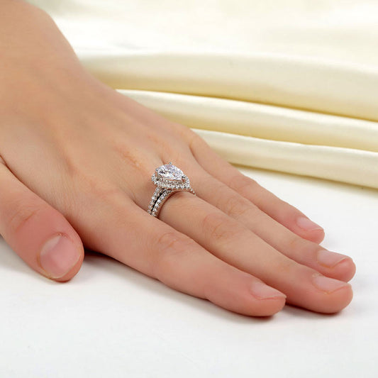 2 CT. Pear Cut Simulated Diamond Halo Bridal Set in Sterling Silver