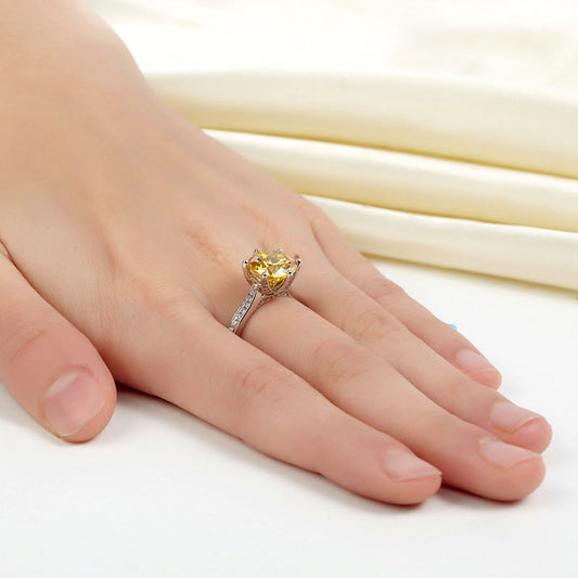 Anillo de plata de ley con diamante simulado amarillo de talla brillante redonda de 3 quilates.
