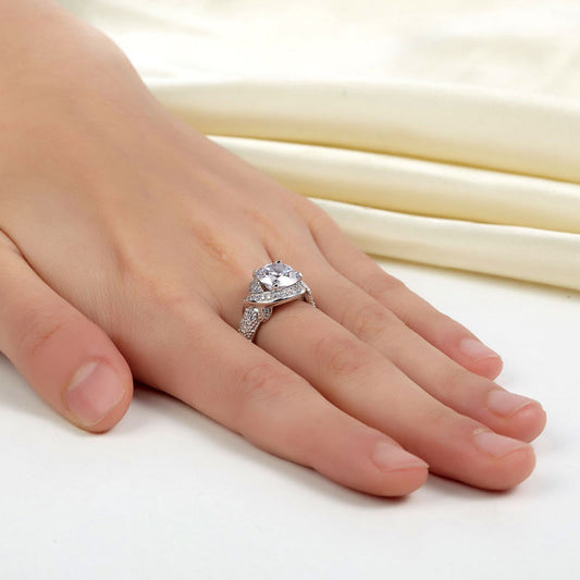 Bague vintage torsadée à halo rond de 2 carats en argent sterling