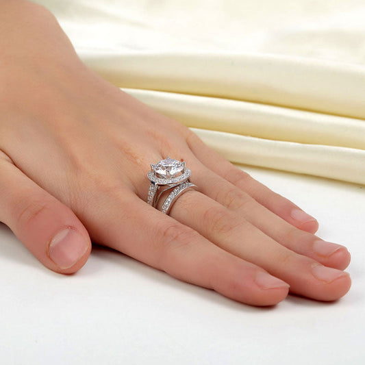 Conjunto nupcial de diamantes simulados con halo redondo de 3,5 quilates en plata de ley