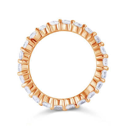 Anillo de eternidad de diamantes simulados redondos de 3 mm en plata de ley y oro rosa.
