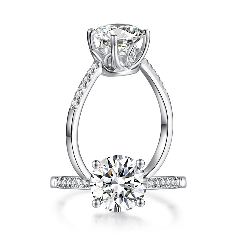 Anillo de compromiso de moissanita redonda de 2 quilates en plata de ley.