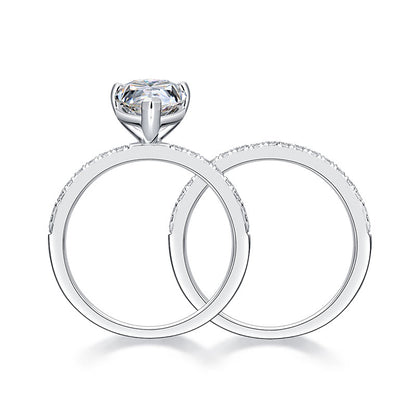 Conjunto nupcial de moissanita de 2 quilates con corte de pera y diamantes en plata de ley.