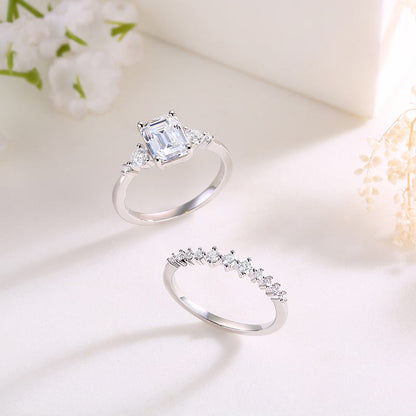 Conjunto nupcial de moissanita de 2 quilates con diamantes de talla esmeralda en plata de ley