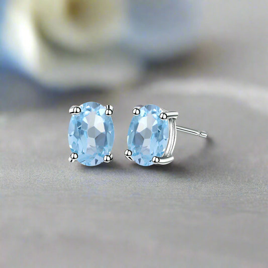 GRACE 1.2 CT. Oval Sky Blue Topaz Stud Earrings in Sterling Silver