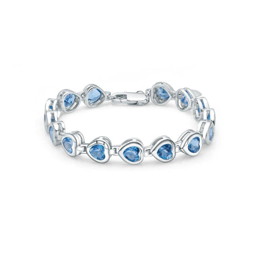 Pulsera GRACE con topacio azul suizo en forma de corazón en plata de ley