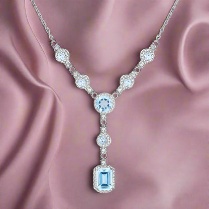 Collar con colgante de piedras preciosas en forma de lazo multipiedra GRACE en plata de ley
