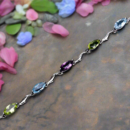 Pulsera GRACE de topacio azul cielo, amatista y peridoto en plata de ley