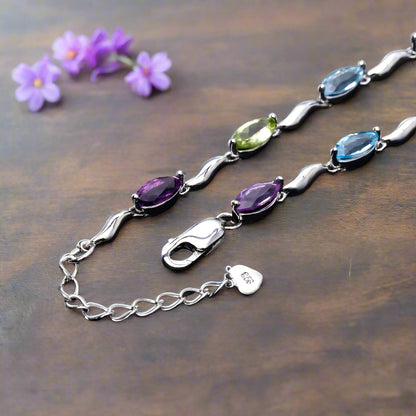 Pulsera GRACE de topacio azul cielo, amatista y peridoto en plata de ley
