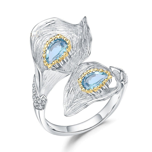 Bague ajustable GRACE en argent sterling et topaze bleue suisse