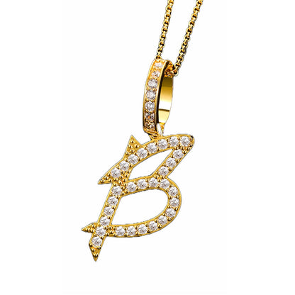 Collar con colgante inicial de moissanita en plata de ley bañada en oro