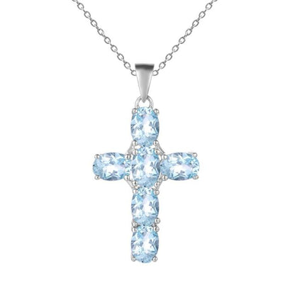 Collar con colgante de cruz de topacio azul cielo ovalado GRACE en plata de ley