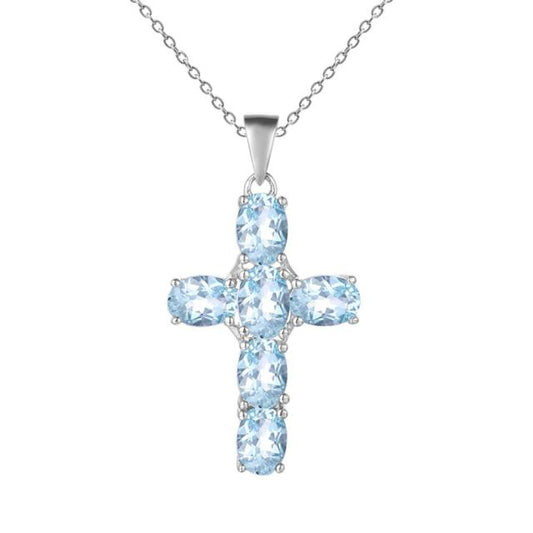 Collar con colgante de cruz de topacio azul cielo ovalado GRACE en plata de ley