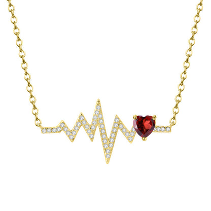 Collar GRACE con corazón de granate rojo y pulso en plata de ley bañada en oro