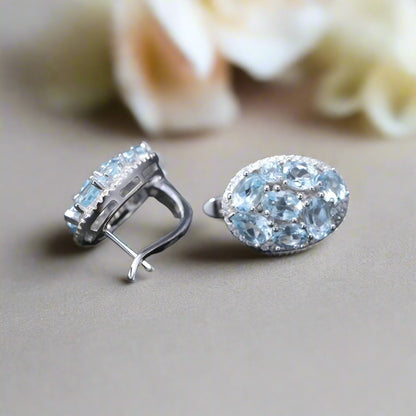 GRACE Sky Blue Topaz Oval Cluster Halo Drop Earrings in Sterling Silver