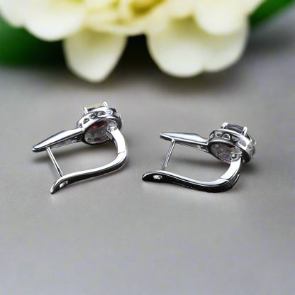 Conjunto de pendientes y anillos con halo de granate rojo GRACE en plata de ley