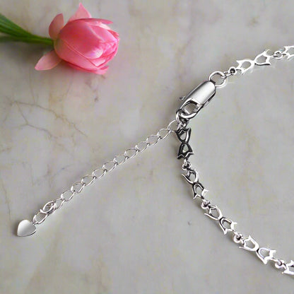 Collar con colgante de piedras preciosas en forma de lazo multipiedra GRACE en plata de ley
